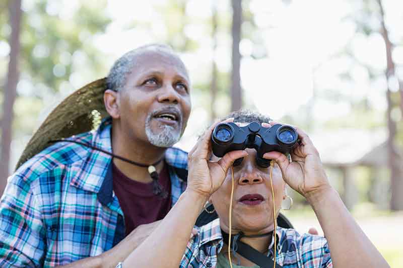 Man with binoculars