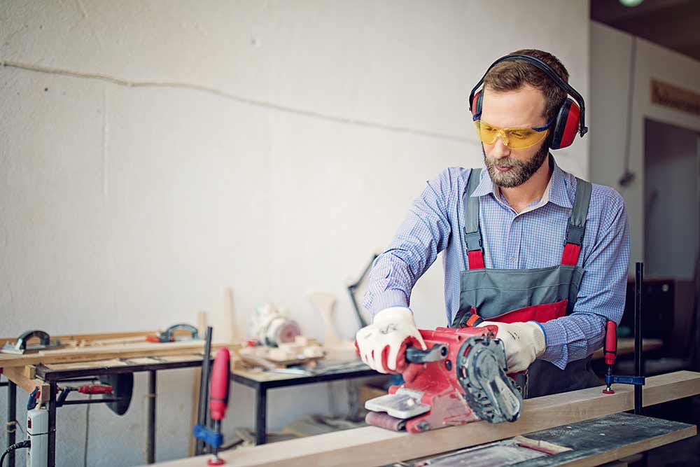 A man working in a sawmill
