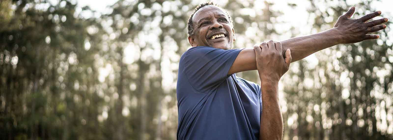 Man stretching his arm out