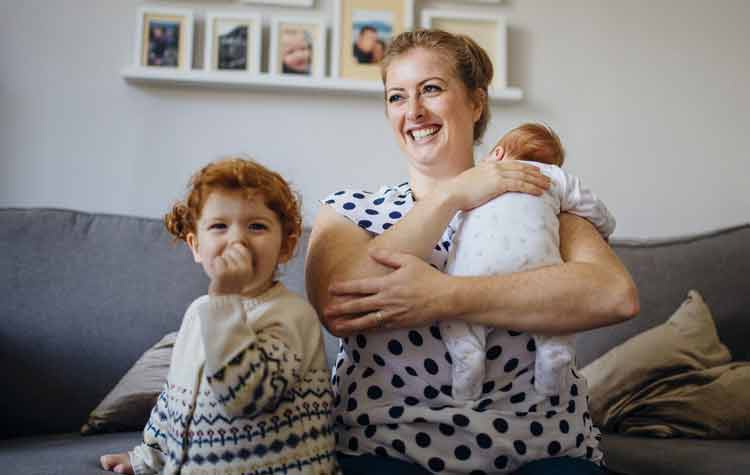 Woman with two young children