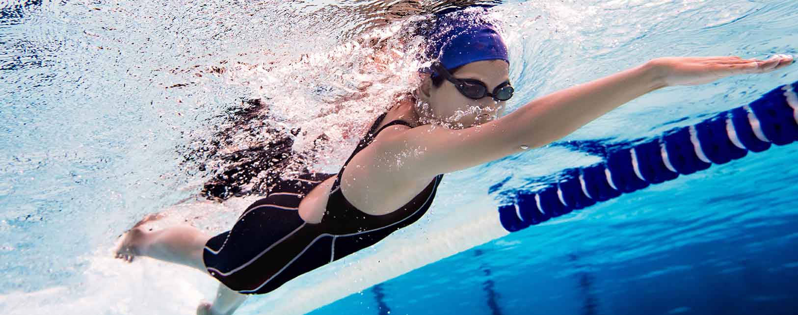 Woman swimming in pool
