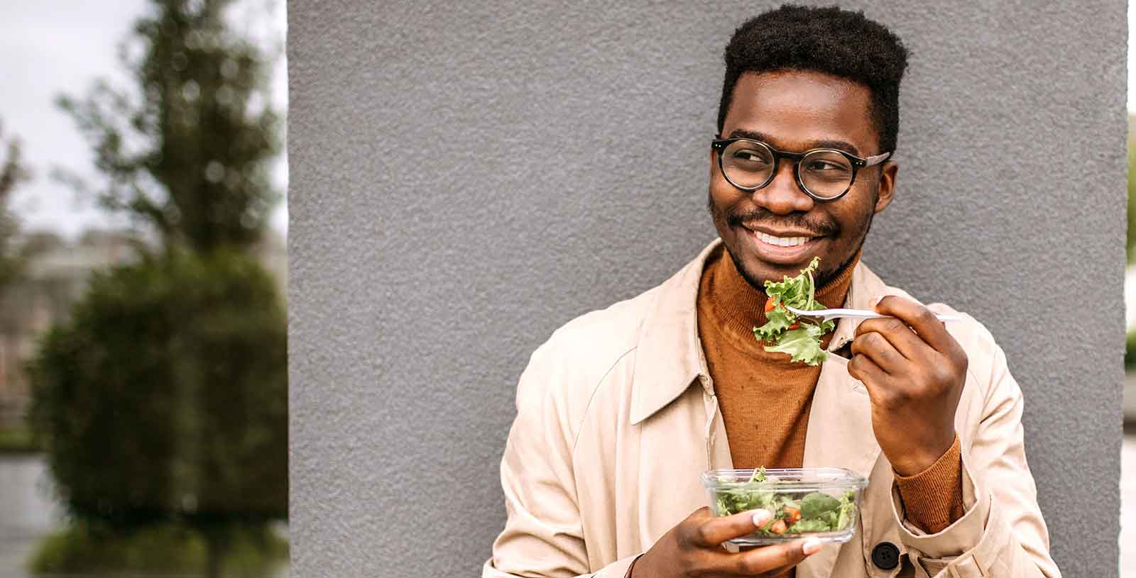 Man eating salad
