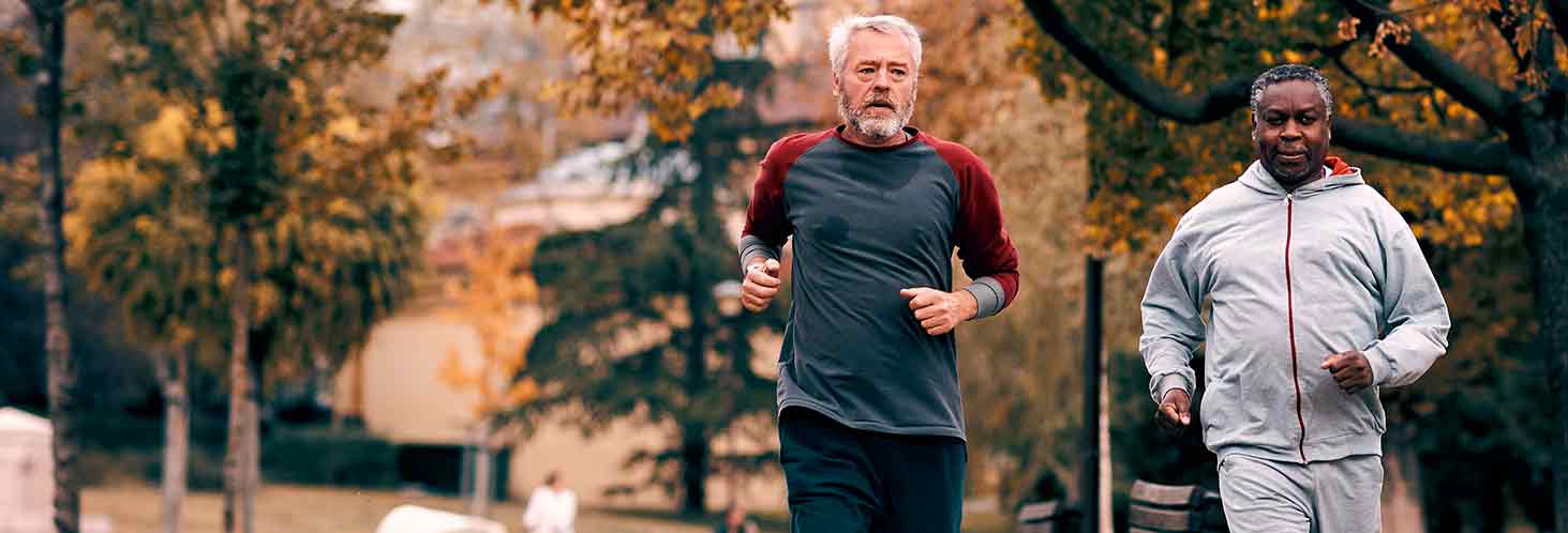 Two men running in the park