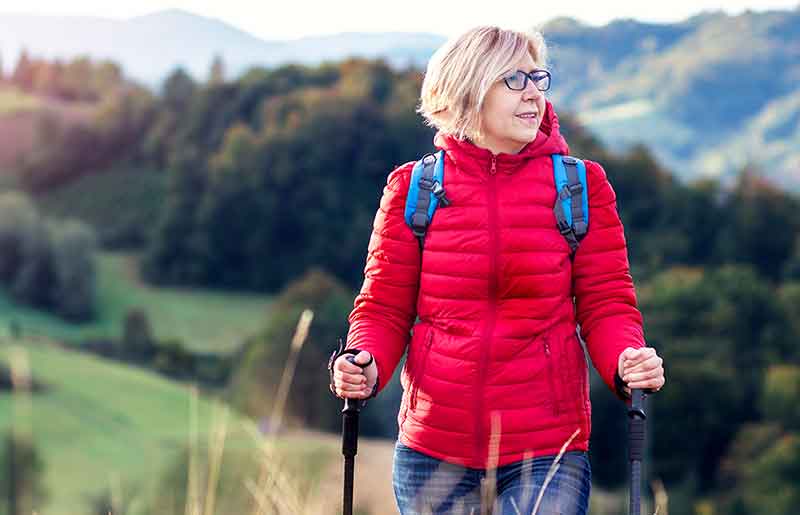 Woman walking in the hills