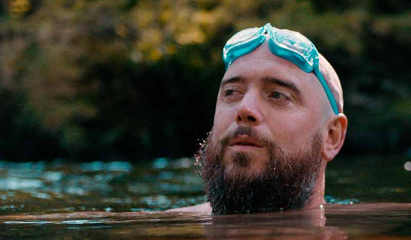 Man open water swimming