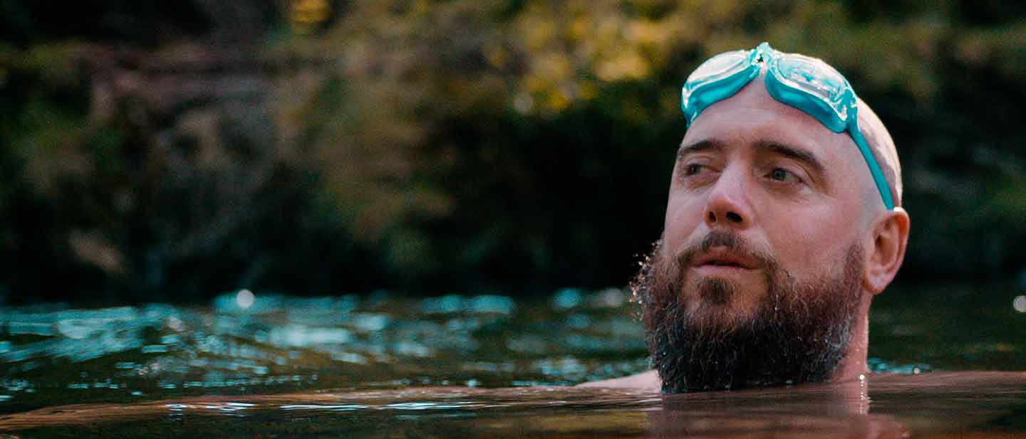 Man swimming in open water