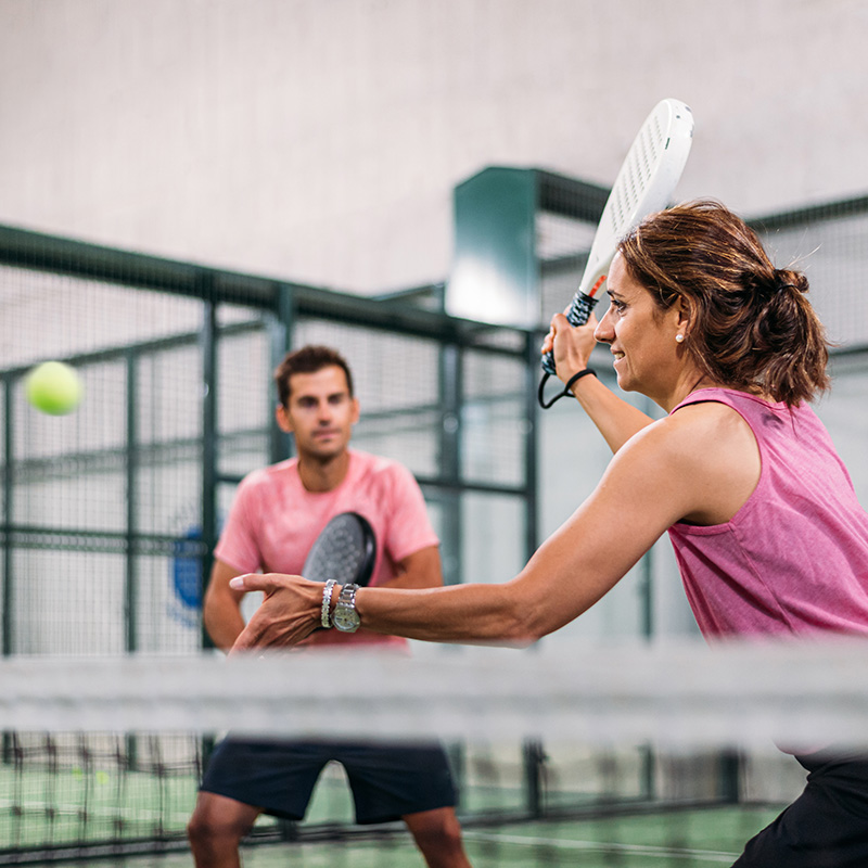 Woman playing padel
