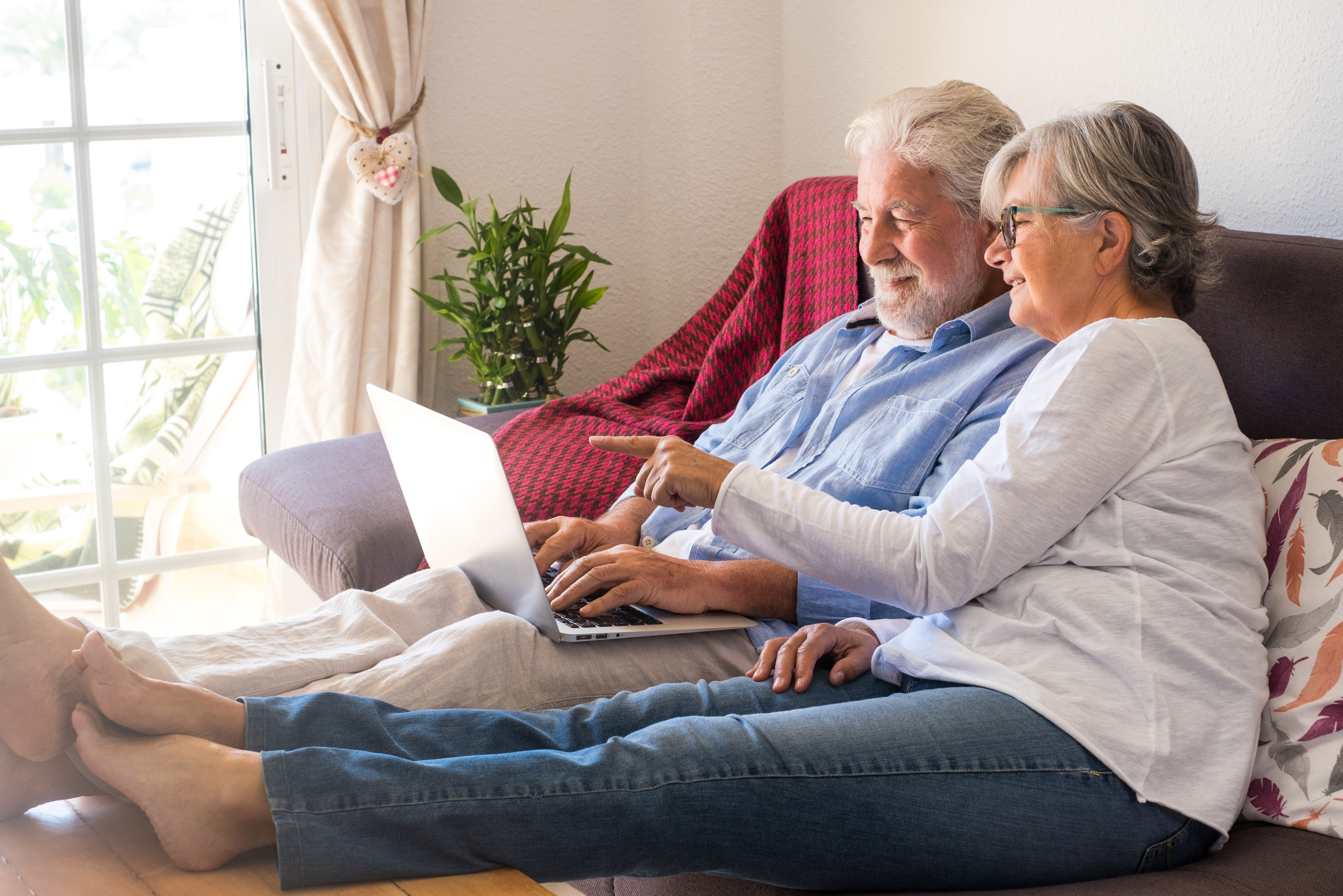 Couple sitting at a laptop