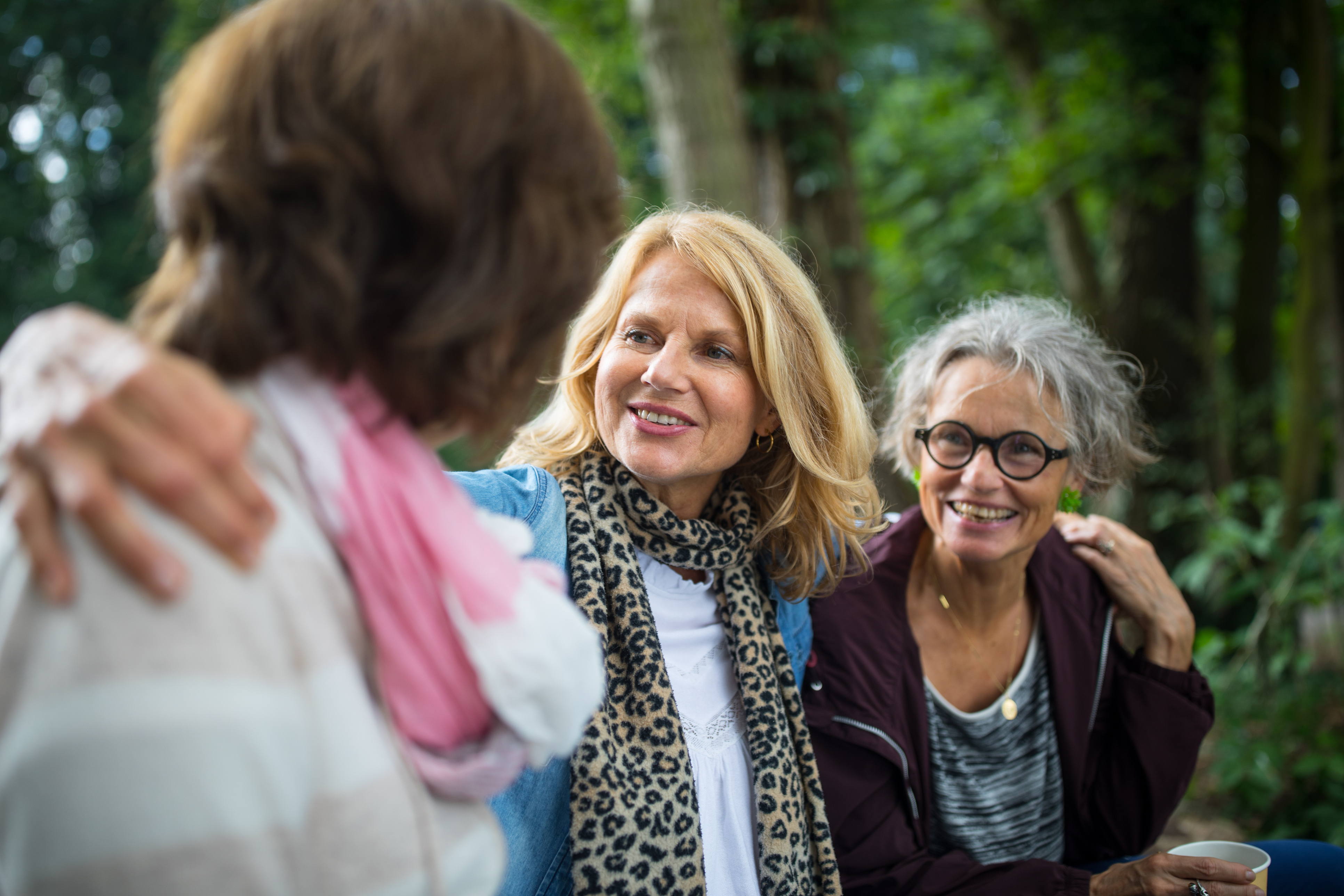 Three women in the the woods