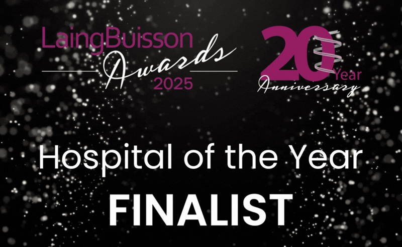 A graphic with a starred background with text saying 'hospital of the year' 