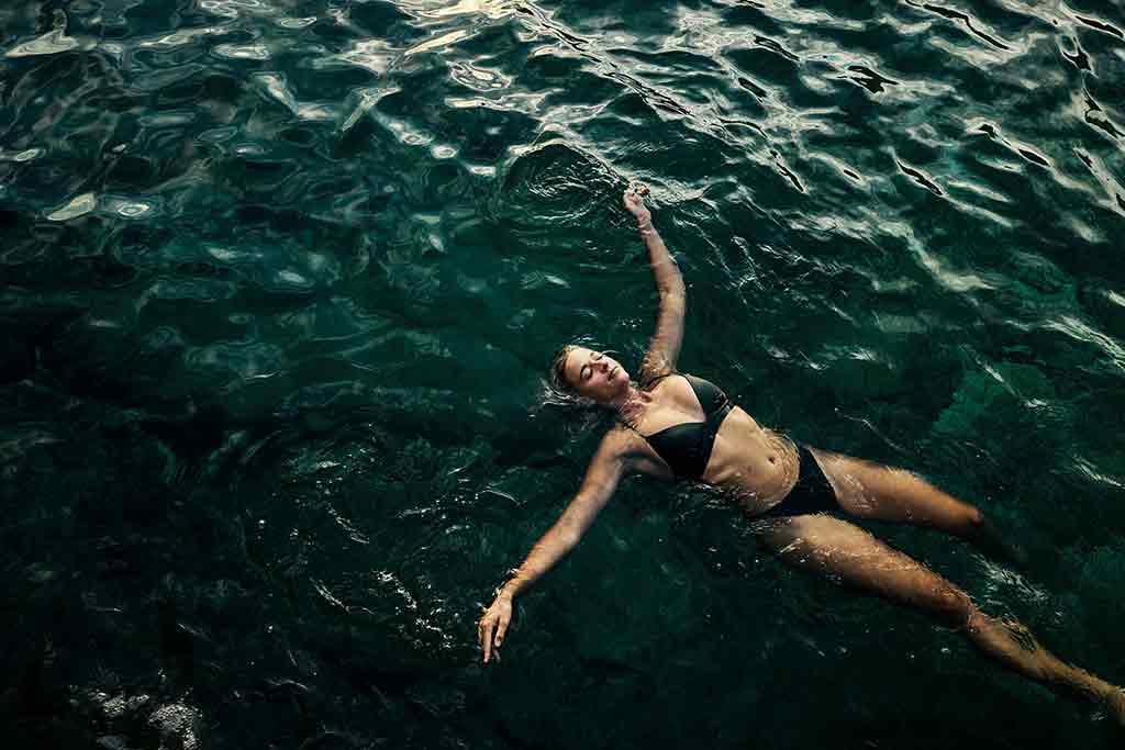 A woman floating in the sea