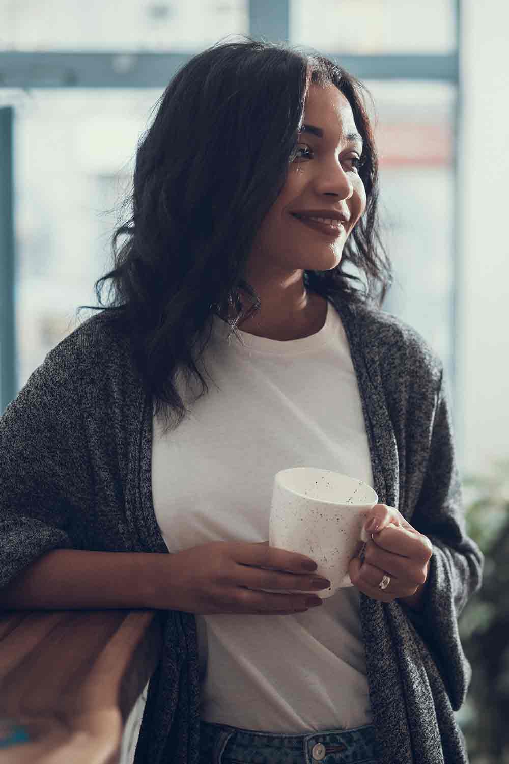 Woman enjoying a cup of coffee
