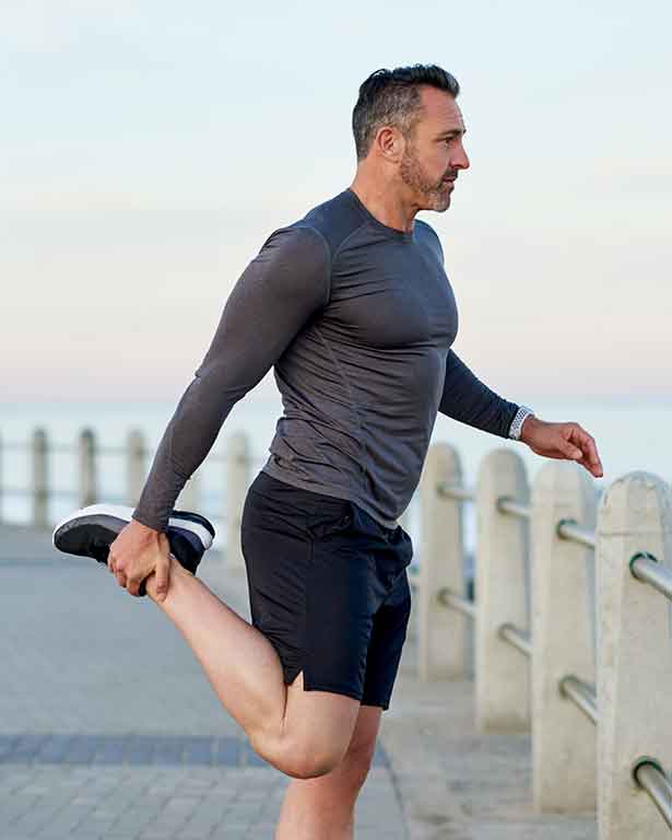 A man stretching before a run