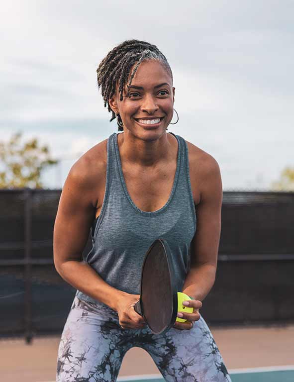 A woman playing tennis