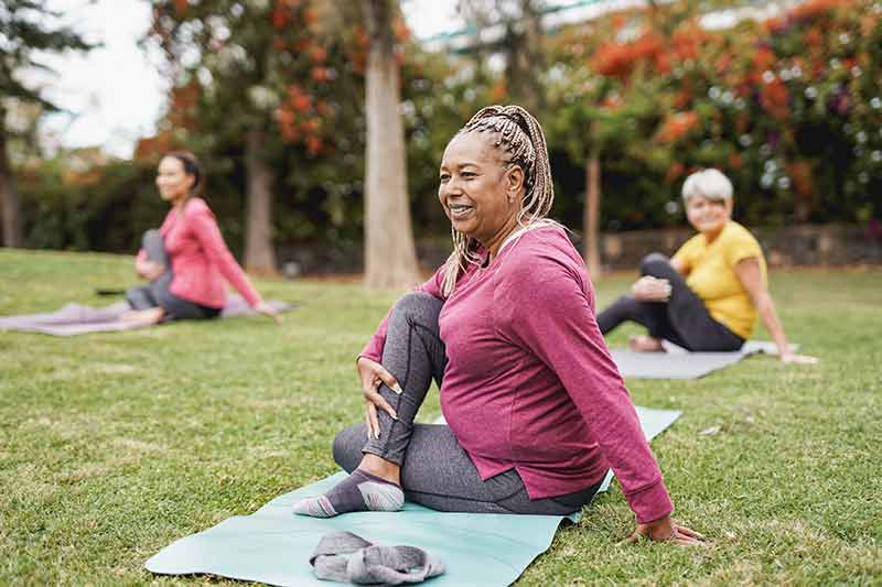 A group of women doing yoga