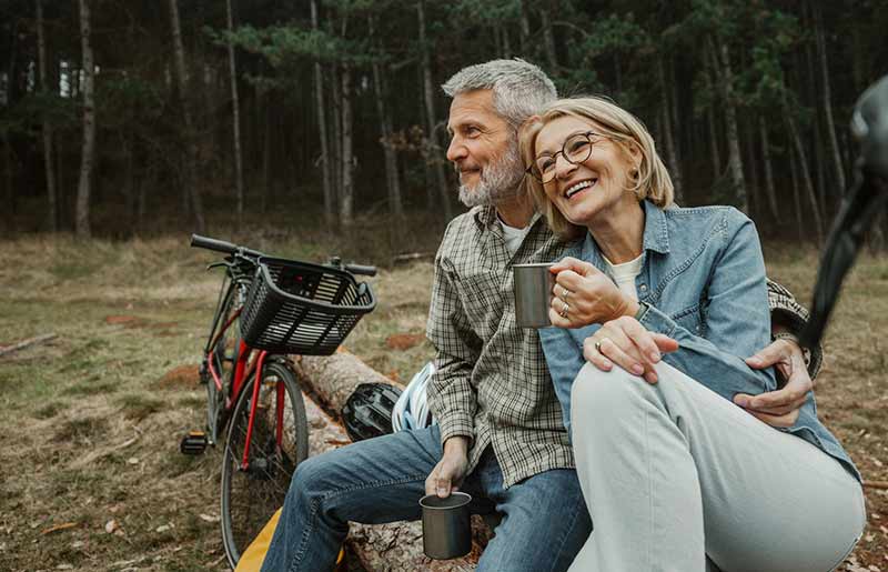 Two people relaxing with a cup of tea