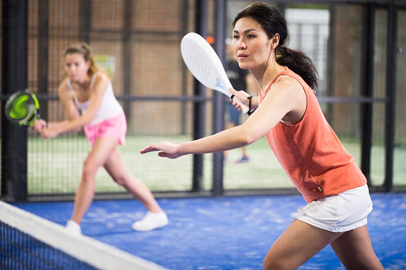Women playing padel