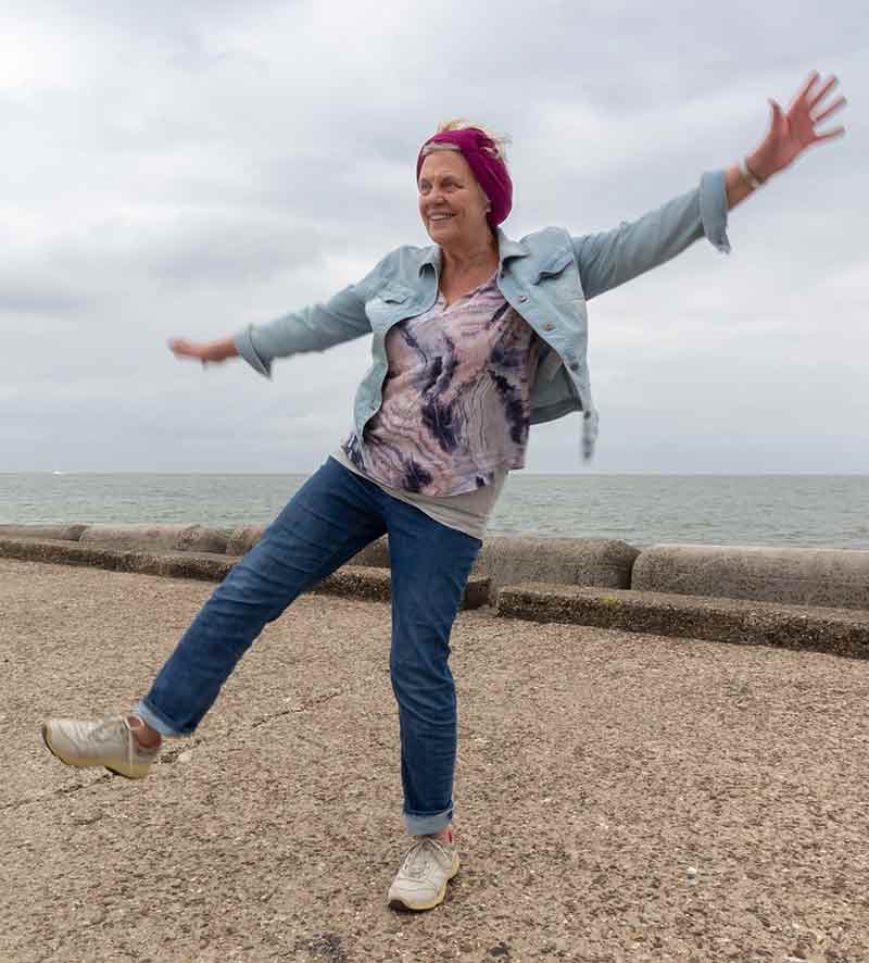 A woman balancing on one leg