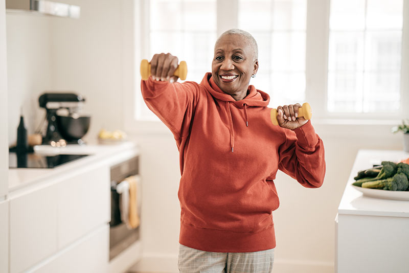 A woman using hand weights