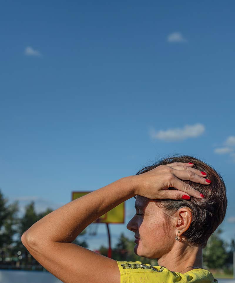 A woman bending her elbow