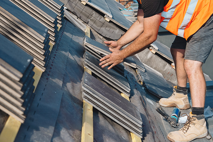 A man working on a roof