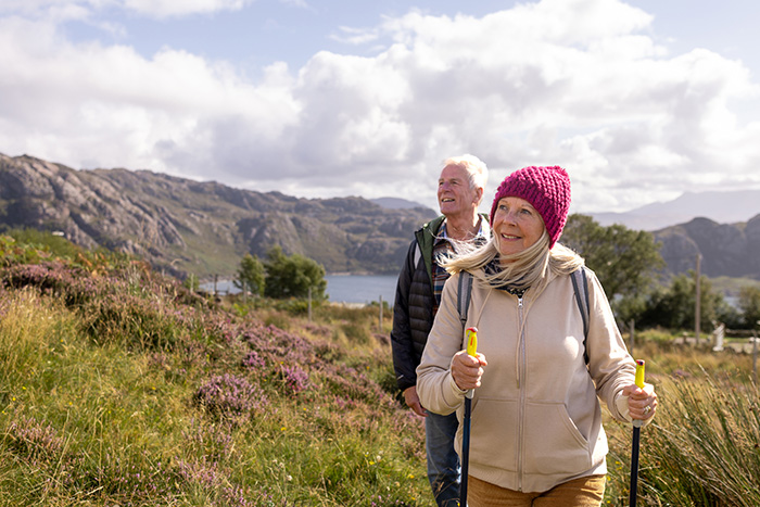 Couple walking in the hills