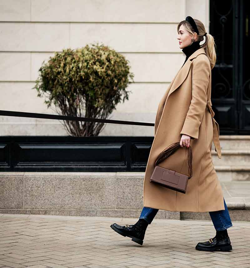 Woman walking down the road