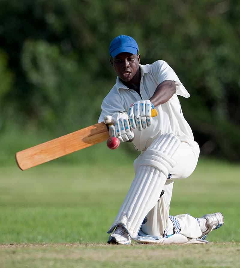 Man playing cricket