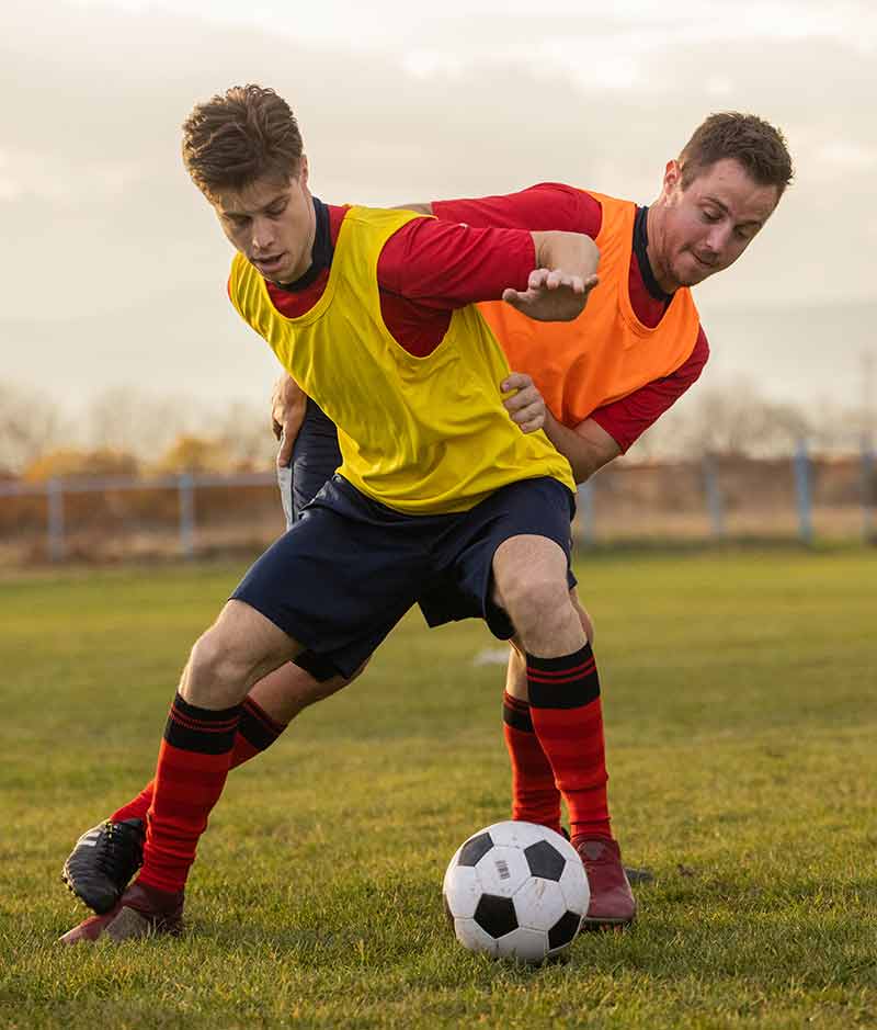 Two men playing football