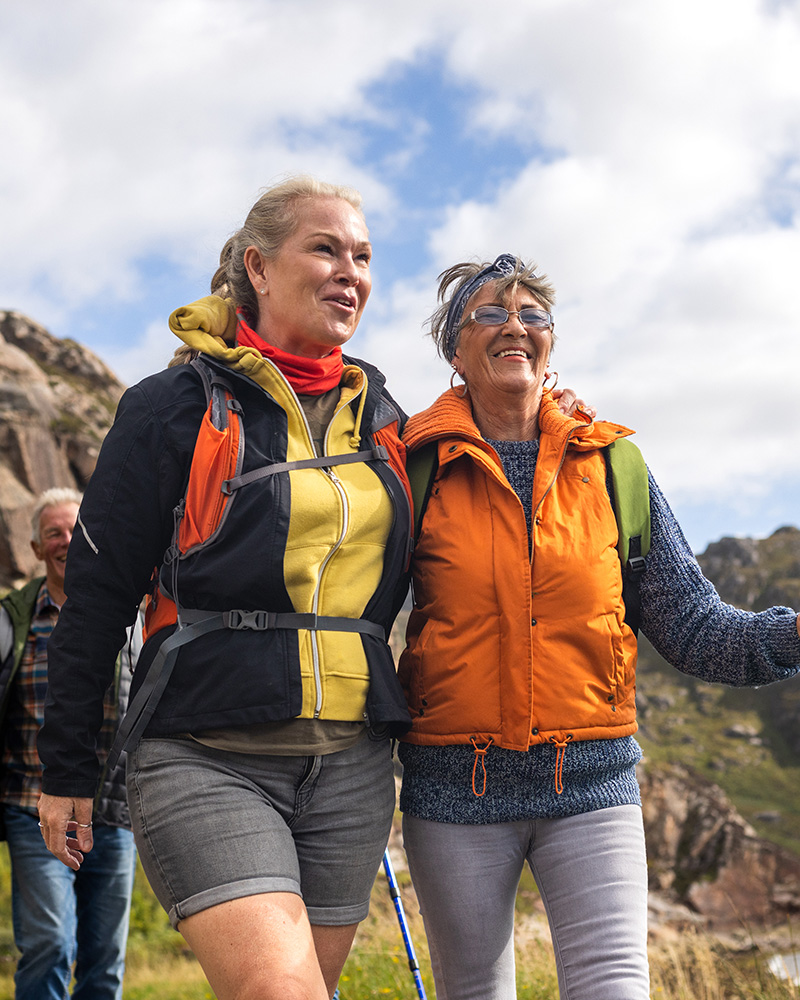 Two mature women hiking