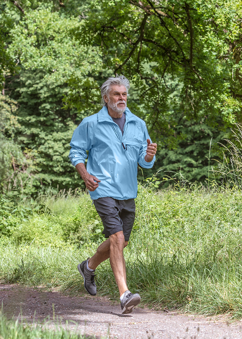 Senior man jogging in the park