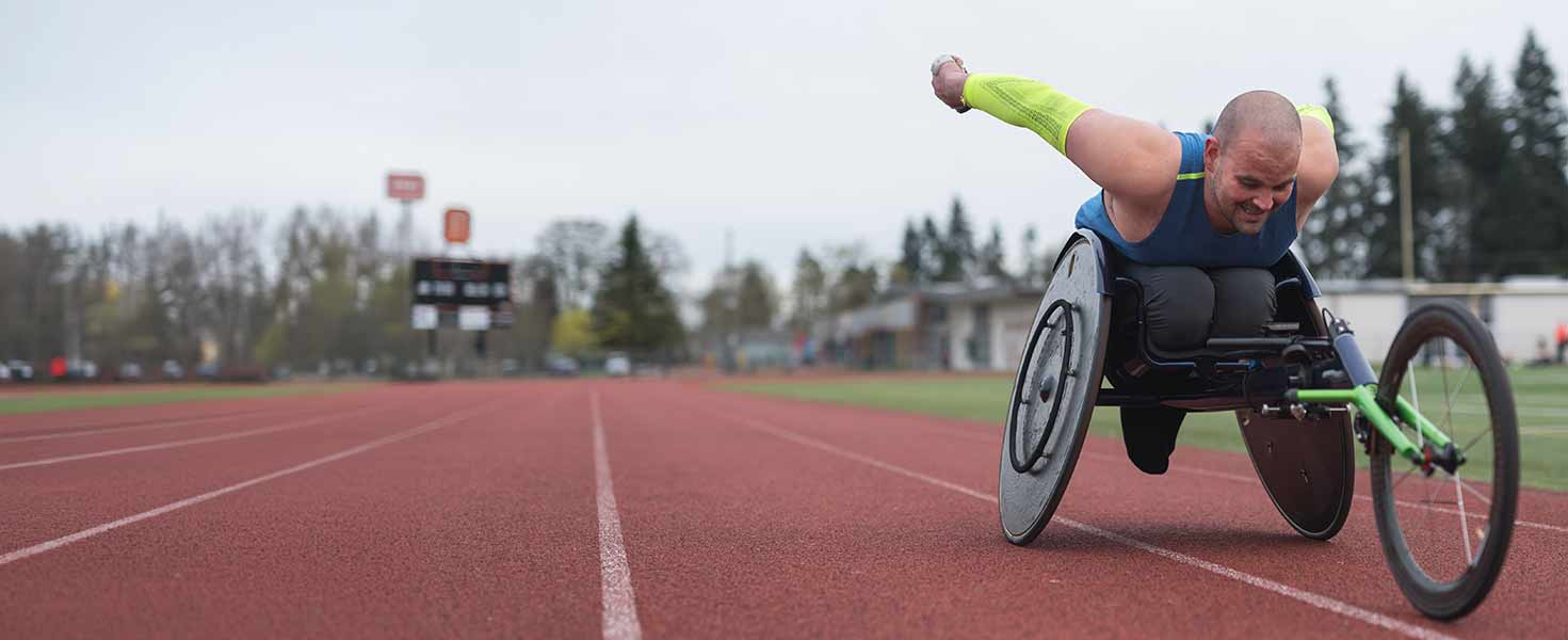 A Paralympian taking part in a wheelchair race