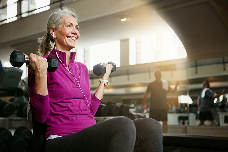 A woman exercising in a gym