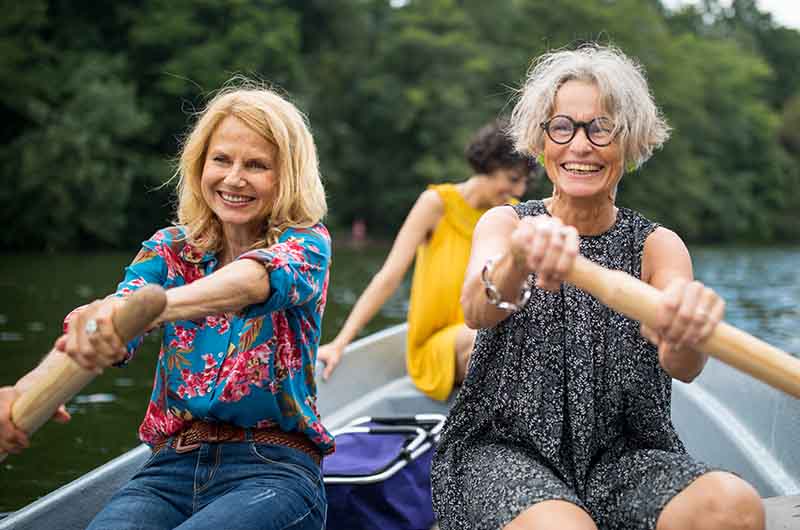 Two women rowing a boat